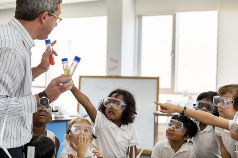 Kindergarten Students Learning in Science Experiment Laboratory Class